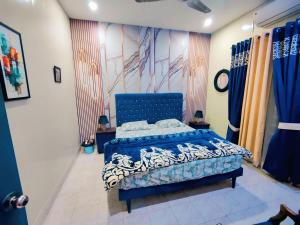 Ένα ή περισσότερα κρεβάτια σε δωμάτιο στο Cozy Villa's