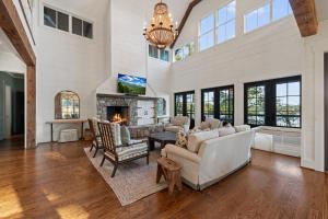 a living room with a couch and a fireplace at Lakeview Landing in Morganton