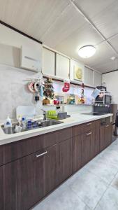 a kitchen with a christmas tree on the counter at YAHouse in Chiba