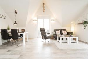 Posezení v ubytování Bürgermeister-Fox 44a Fehmarn Brise