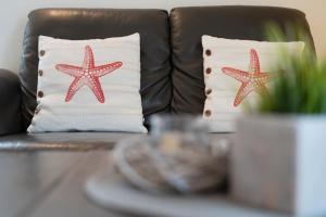 Posezení v ubytování Bürgermeister-Fox 44a Fehmarn Brise