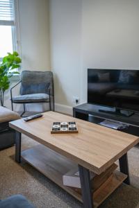 TV a/nebo společenská místnost v ubytování Neilston Gateaway