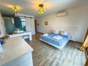 Voodi või voodid majutusasutuse Sa Iba Resort toas +52 fotot