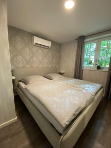 Ένα ή περισσότερα κρεβάτια σε δωμάτιο στο Urlaub im Münsterland