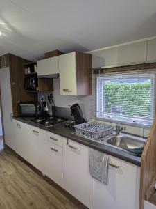 Kuchyň nebo kuchyňský kout v ubytování Chalet SEASIDE + 6 fotografií