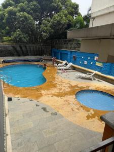 Swimmingpoolen hos eller tæt på Magnífico apartamento