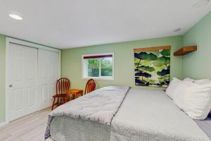 Giường trong phòng chung tại Light & Leisure