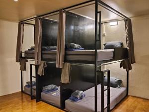 a group of bunk beds in a room at JAM's HOSTEL in Koh Phangan +17 photos