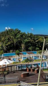 Πισίνα στο ή κοντά στο Mirantes Caminho do Mar Apto Térreo Lado da Sombra