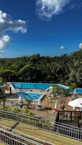 Πισίνα στο ή κοντά στο Mirantes Caminho do Mar Apto Térreo Lado da Sombra