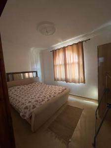 Ένα ή περισσότερα κρεβάτια σε δωμάτιο στο Modern apartment