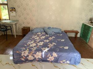 Ένα ή περισσότερα κρεβάτια σε δωμάτιο στο Cucu Suzanne