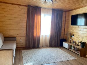 TV/trung tâm giải trí tại Center Cottage Чан