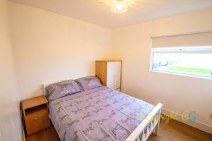 Кровать или кровати в номере K149 Parkdean Camber Sands