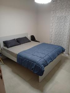 Ένα ή περισσότερα κρεβάτια σε δωμάτιο στο Central apartment's in Trikala 2