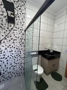 Ένα μπάνιο στο Casa Nova com Área Gourmet e Conforto Premium