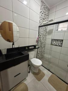 Ένα μπάνιο στο Casa Nova com Área Gourmet e Conforto Premium