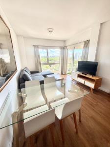 TV a/nebo společenská místnost v ubytování Fantástico depto. con vistas panorámicas + 44 fotografií