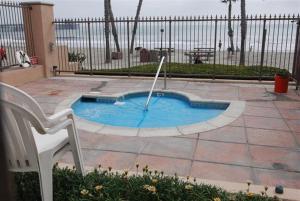 a small pool with a fountain in the middle of a patio at 501P-12 Spectacular Ocean Views Pet Friendly in Oceanside
