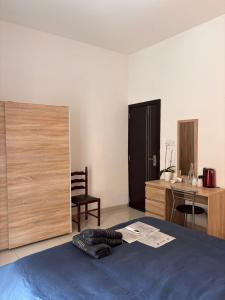 Postel nebo postele na pokoji v ubytování Central Sliema Airconditioned and Spacious