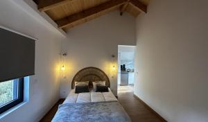 Postel nebo postele na pokoji v ubytování Quinta do Codeçal