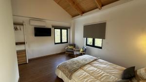 TV a/nebo společenská místnost v ubytování Quinta do Codeçal