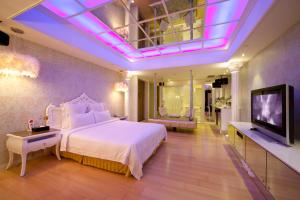 Televisyen dan/atau pusat hiburan di Wego Hotel - Linsen