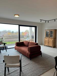 Posezení v ubytování Luxury Apartment Antwerp Port Moerbeke 2