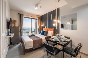 Postel nebo postele na pokoji v ubytování Unixx Pattaya by Chanakan + 224 fotografií