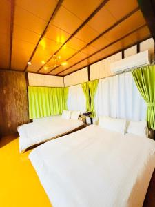 Voodi või voodid majutusasutuse アンペ別邸 別府鉄輪 Ampe Villa Beppu kannawa toas