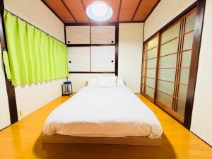 Voodi või voodid majutusasutuse アンペ別邸 別府鉄輪 Ampe Villa Beppu kannawa toas