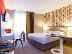Ένα ή περισσότερα κρεβάτια σε δωμάτιο στο ibis Styles Chaumont Centre Gare +60 φωτογραφίες