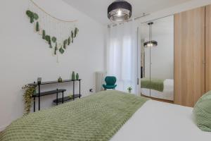 Postel nebo postele na pokoji v ubytování 'Suite Bailo' - Treviso center - Near VENICE - wi-fi e AC free - Smart working