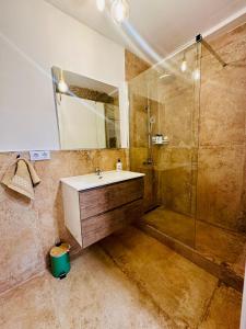 Koupelna v ubytování Las Arenas del Coliseo + 5 fotografií