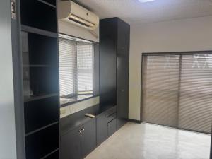a room with black cabinets and a window at K5 Building - Vacation STAY 20273 in Nabegayato