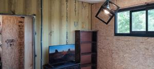 Et tv og/eller underholdning på CASA CONTAINER BOSQUE Y MAR