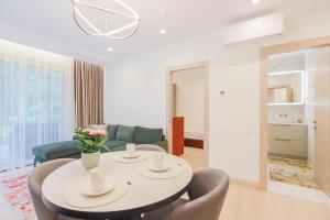 Χώρος καθιστικού στο Simpsono Apartamentai +43 φωτογραφίες