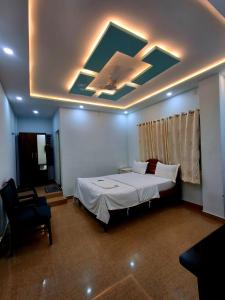 Ένα ή περισσότερα κρεβάτια σε δωμάτιο στο Nagadeep Residency +3 φωτογραφίες