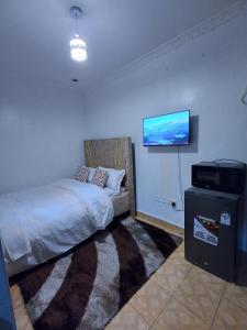Ένα ή περισσότερα κρεβάτια σε δωμάτιο στο Fine Stay Classy Studio Lower Kabete +10 φωτογραφίες
