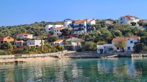 a town on the shore of a body of water at Apartments Solis, 50 m from the sea - Jakišnica in Jakišnica