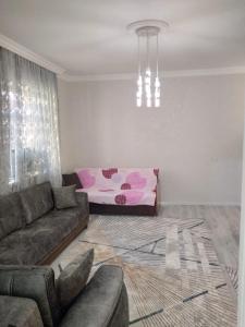 Posezení v ubytování City Center Apartment