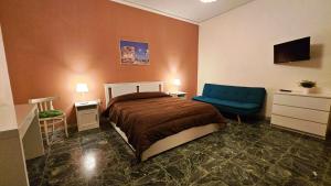 Ένα ή περισσότερα κρεβάτια σε δωμάτιο στο Dimore Demetra