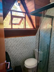 Phòng tắm tại Chalé Pousada Finca dos Anjos