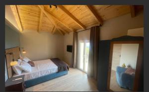 Giường trong phòng chung tại Cephalonian Casa