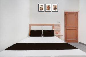 Ένα ή περισσότερα κρεβάτια σε δωμάτιο στο Hotel O prream view