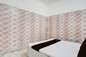 Ένα ή περισσότερα κρεβάτια σε δωμάτιο στο Hotel O prream view