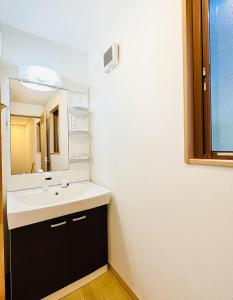 Koupelna v ubytování Cozy Cove Hakuba + 8 fotografií