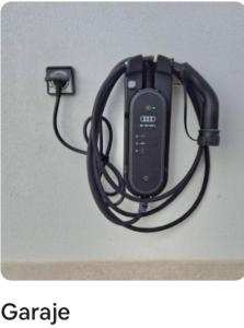 a cell phone is hooked up to a wall at The White House Toledo in Toledo +28 photos