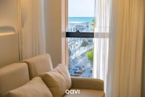 Posezení v ubytování Flats no Mares de Cabo Branco by QAVI