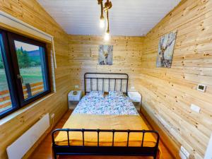 Postel nebo postele na pokoji v ubytování Cheia Kub 35